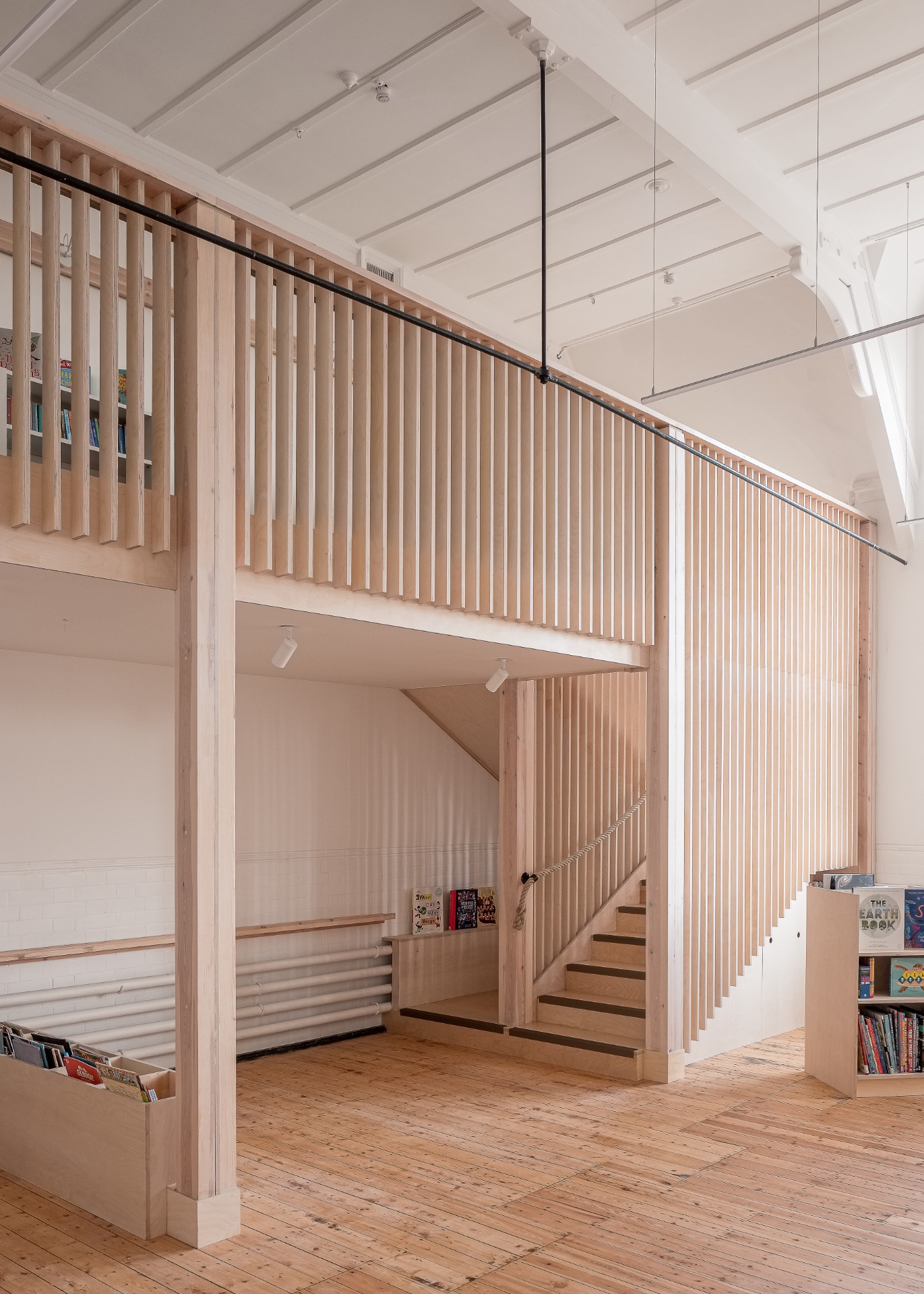 Nunhead: New Architecturally detailed timber mezzanine structure for school library, with Yellow Kite Architects and Tom Wilson Studio