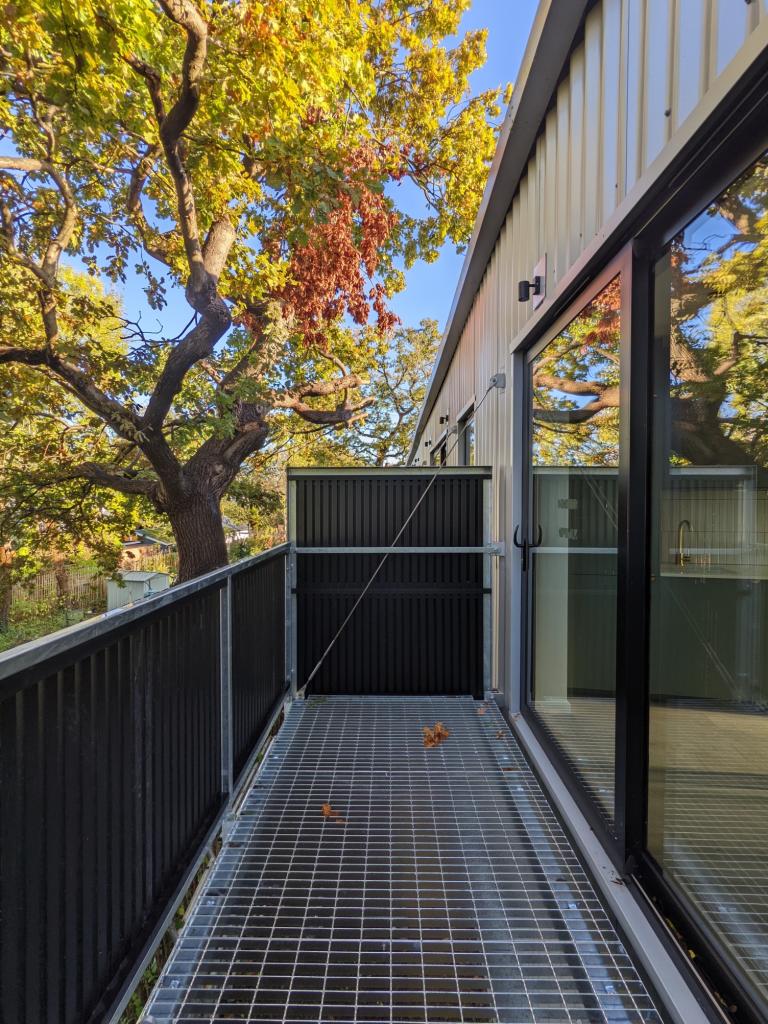 Beckenham: Conversion of Victorian property and two warehouse buildings into flats, with folding balconies to the rear. With SorghumBirch